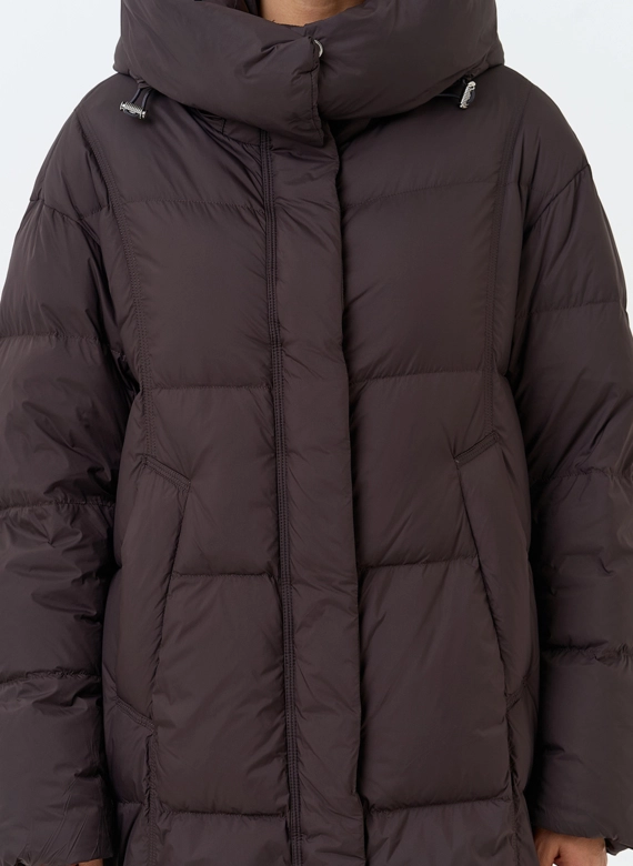 Женский пуховик с капюшоном фото
