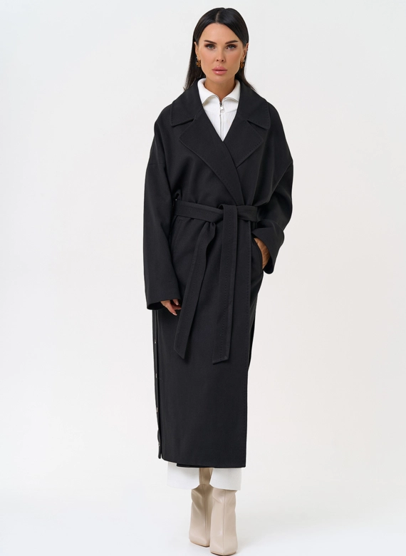 Женское пальто черного цвета с функциональными кнопками фото